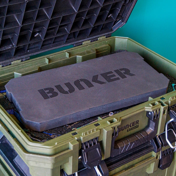 A gray Bunker Cushion in a Bunker load up box