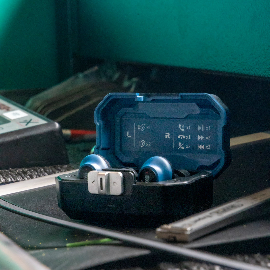 Close up of the DXPULSE Noise Isolating Earbuds with Charging Case
