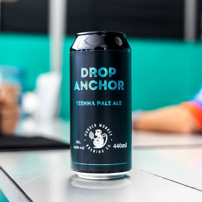 A black aluminum can of Drop Anchor Vienna Pale Ale