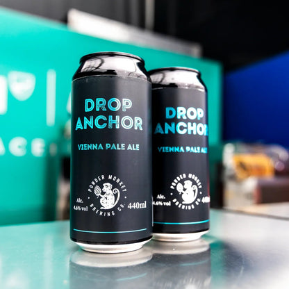 Two cans of Drop Anchor Vienna Pale Ale by Powder Monkey