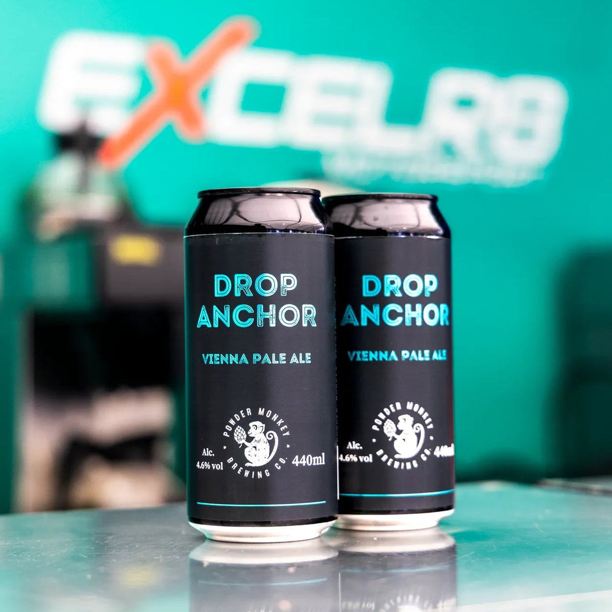 Two black aluminium cans of Drop Anchor  PALE ALE