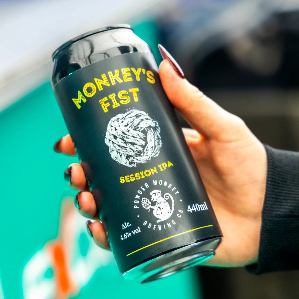 Monkeys Fist Session IPA Beer in a hand