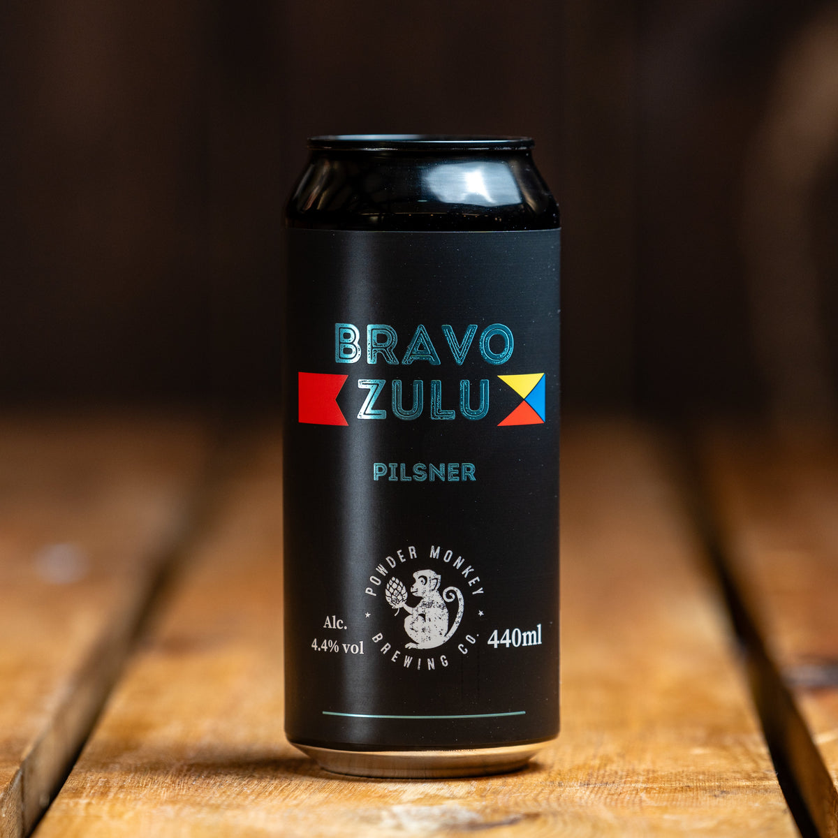 A black can of Bravo Zulu Pilsner from Powder Monkey Brewing Co